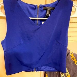 A blue high top with a zipper on the back.